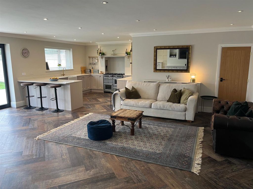 Property photo 2 of 19 Family & Kitchen.Jpg