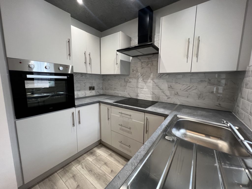 Property photo 3 of 13 Kitchen