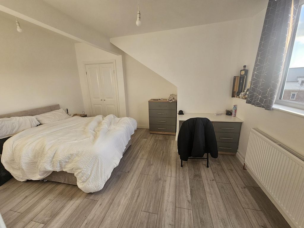 Property photo 1 of 9 Bright And Spacious Master Bedroom Featuring A Com...