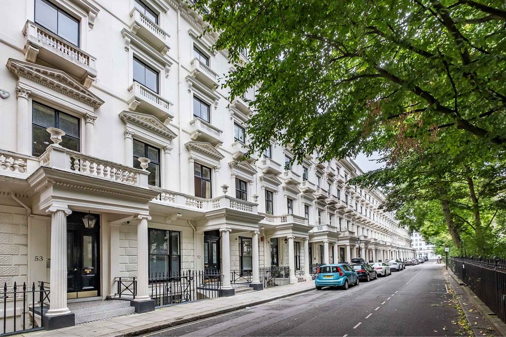 Property photo 3 of 17 Renovated White Stucco Fronted Building