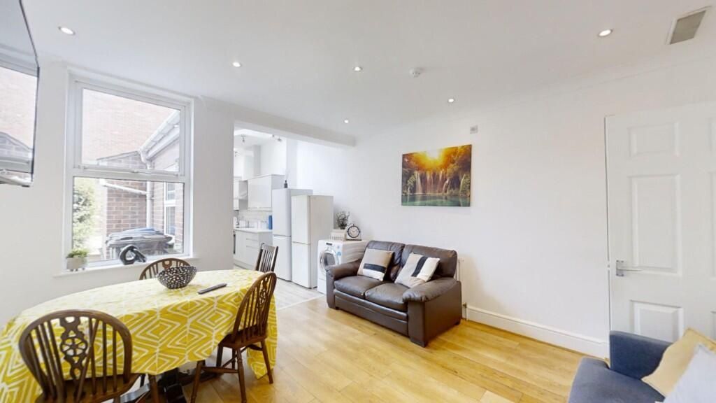 Property photo 2 of 13 A Bright And Airy Living Room With Large Windows l...