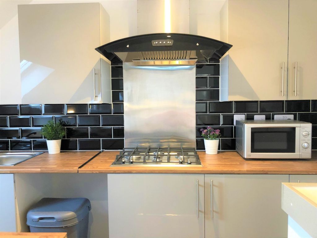 Property photo 2 of 12 Modern Kitchen Area Featuring A Sleek Gas Hob With...