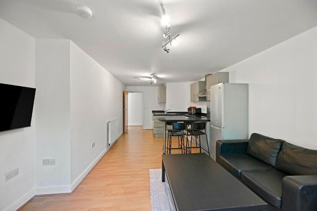 Property photo 2 of 12 A Modern And Tidy Open-Plan Living Room Featuring ...