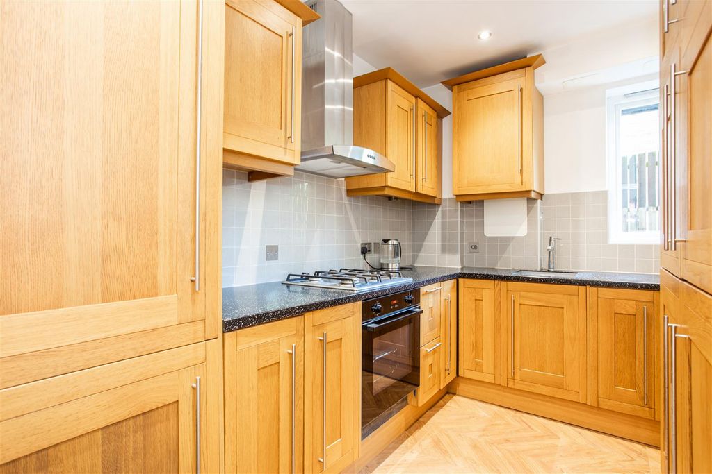 Property photo 3 of 12 Kitchen