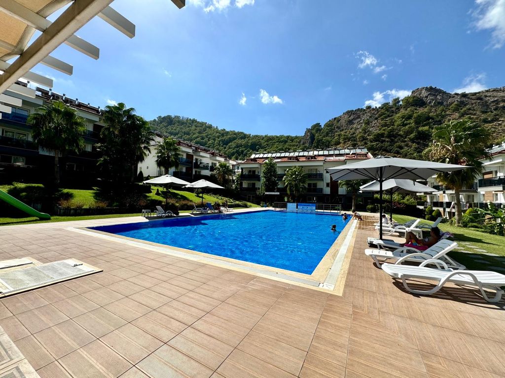 Property photo 3 of 15 A Stylish Key-Ready Fethiye Property For Sale – A Large Communal Pool And Sun Terraces Along With Gardens