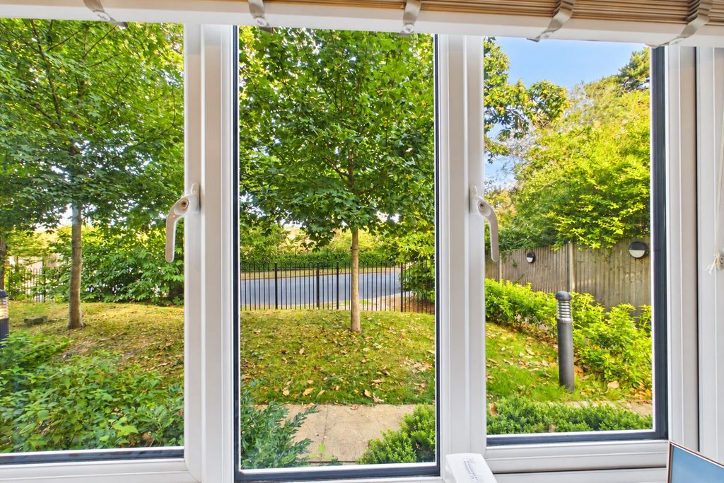 Property photo 3 of 15 1-Sunny Garden View Through White Window.Png