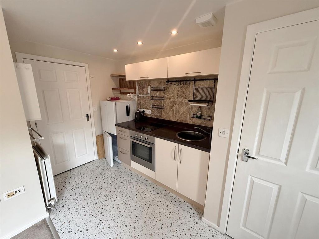 Property photo 3 of 13 Kitchen Area