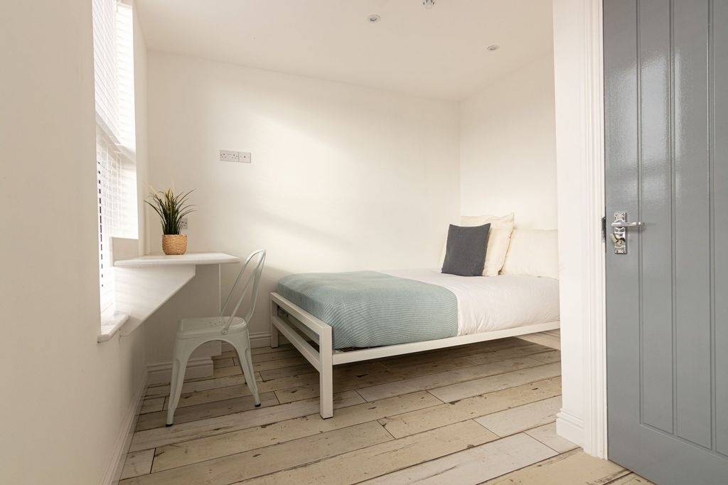 Property photo 3 of 13 Bright, Minimalist Bedroom With Pale Wood Floors, ...