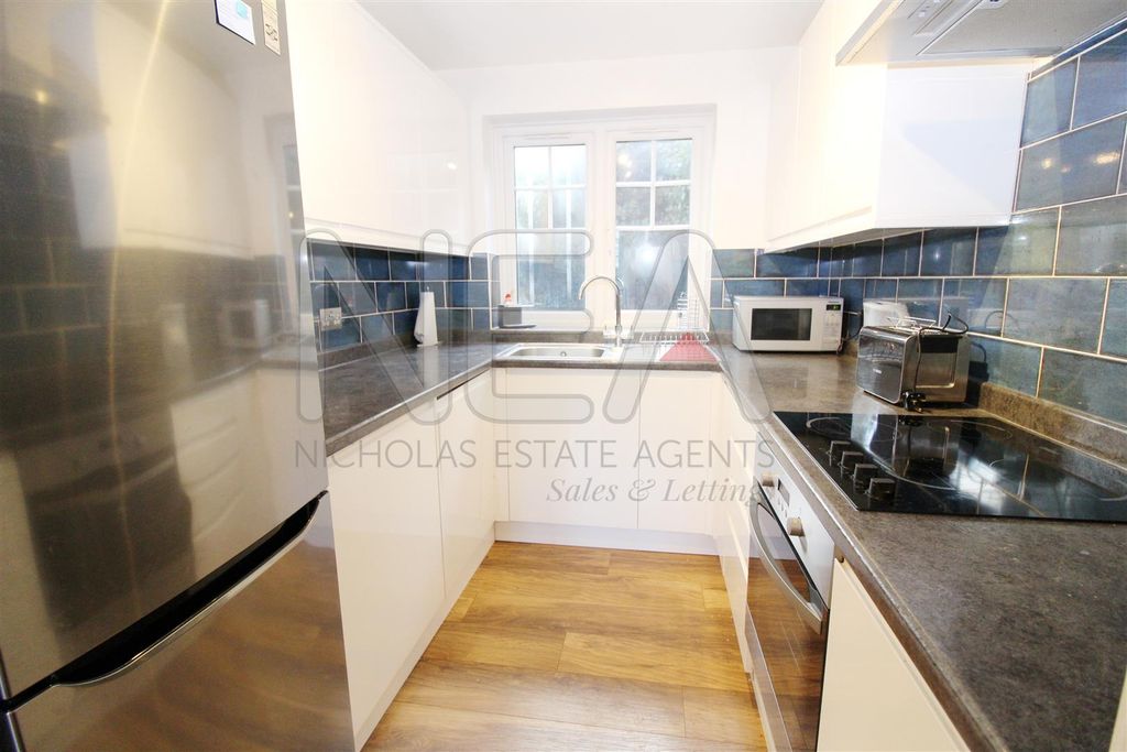 Property photo 2 of 9 Kitchen