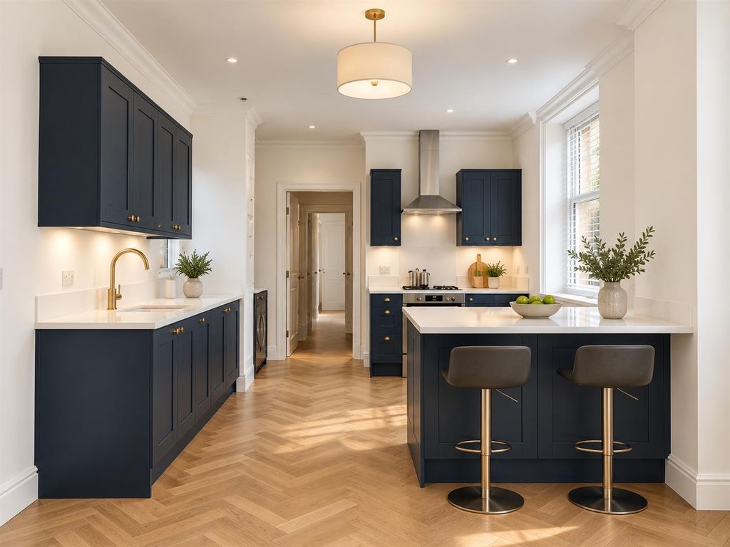 Property photo 2 of 6 Sunlit Navy Shaker Kitchen With Brass Accents.Png