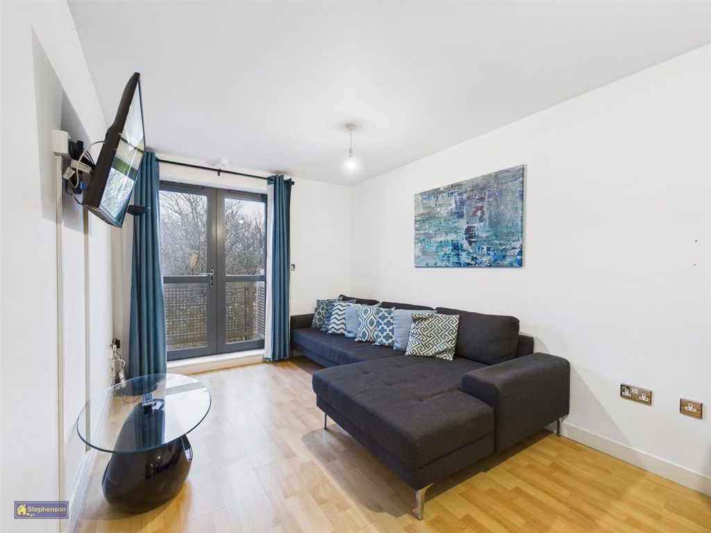 Property photo 2 of 8 Living Area