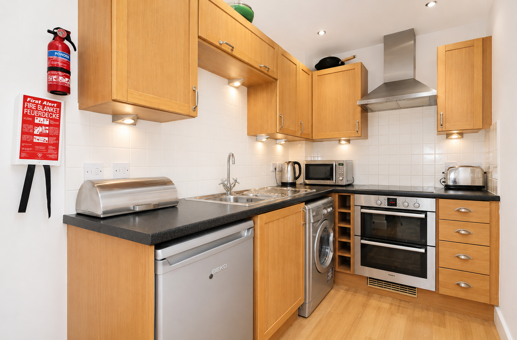 Property photo 3 of 6 Kitchen - Angle 1