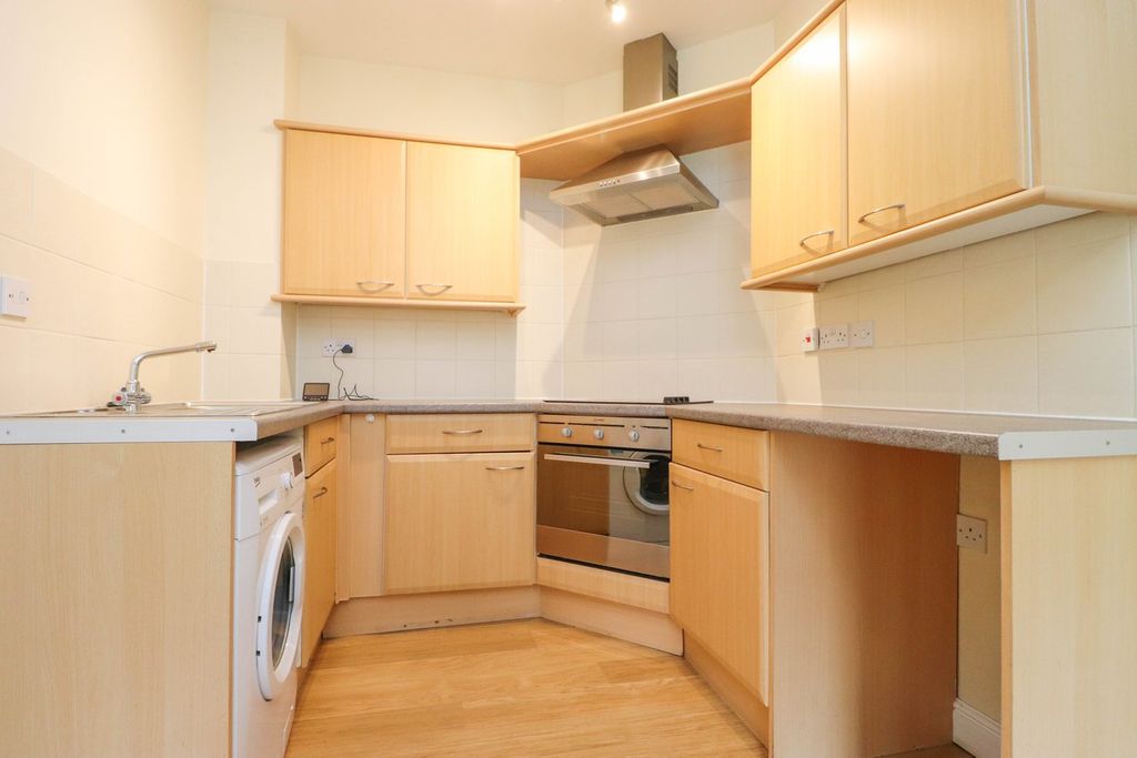 Property photo 3 of 9 Kitchen Area