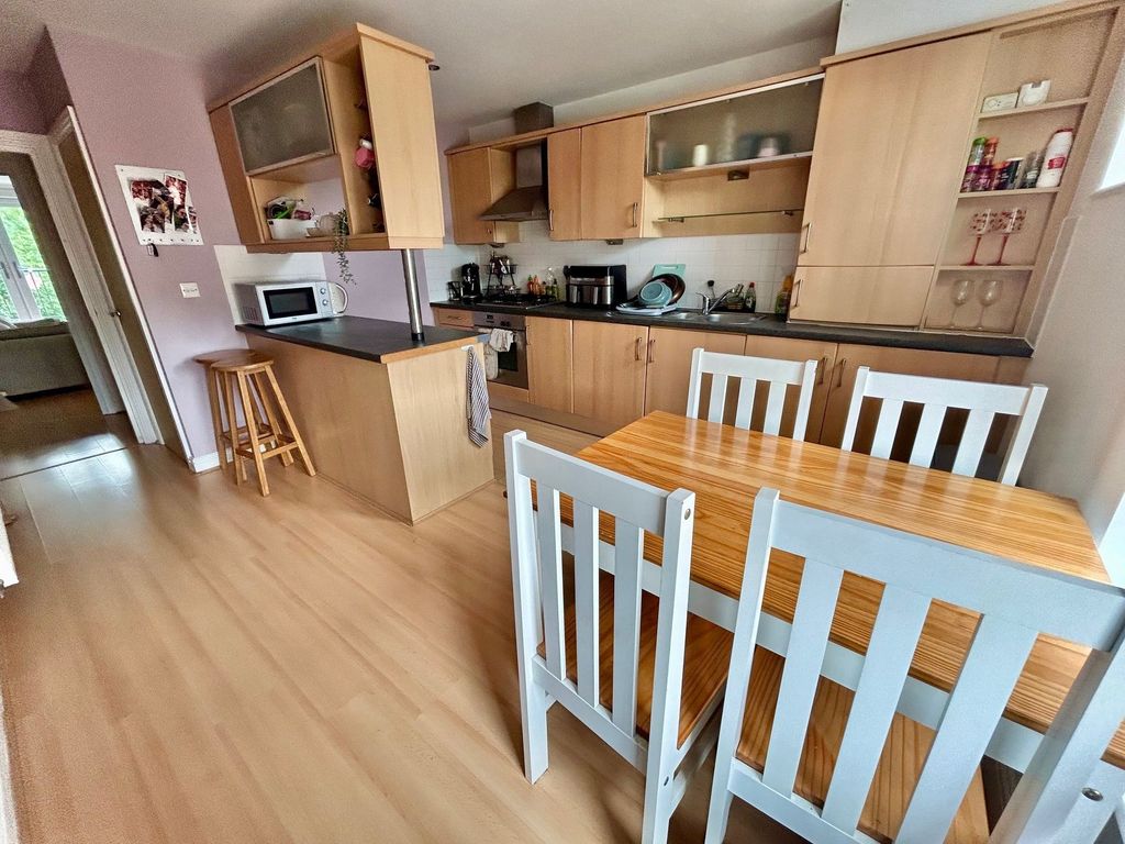 Property photo 3 of 12 Dining Kitchen
