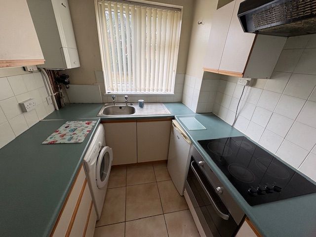Property photo 3 of 12 Kitchen