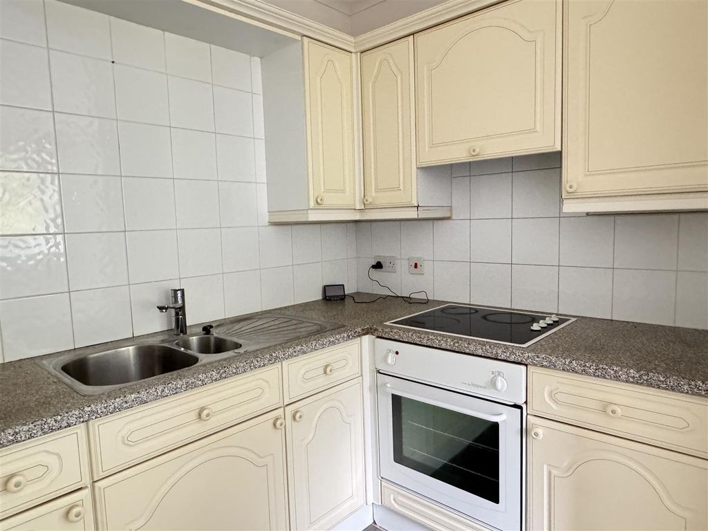 Property photo 3 of 15 Kitchen Area