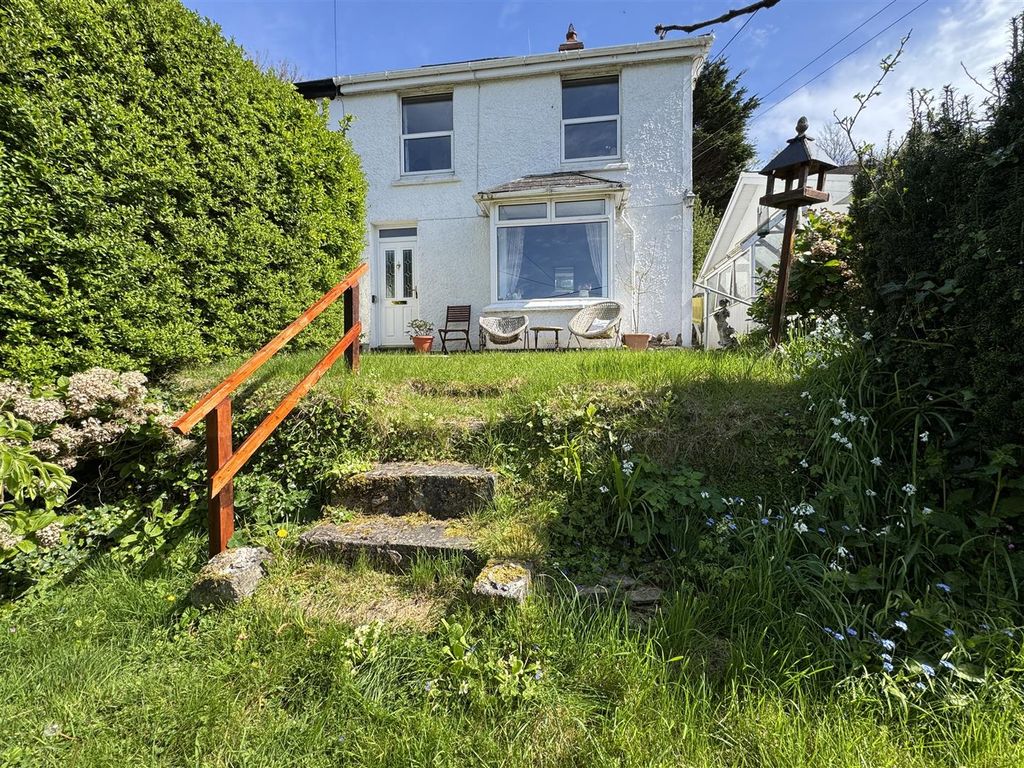 Property photo 2 of 14 Front With Garden