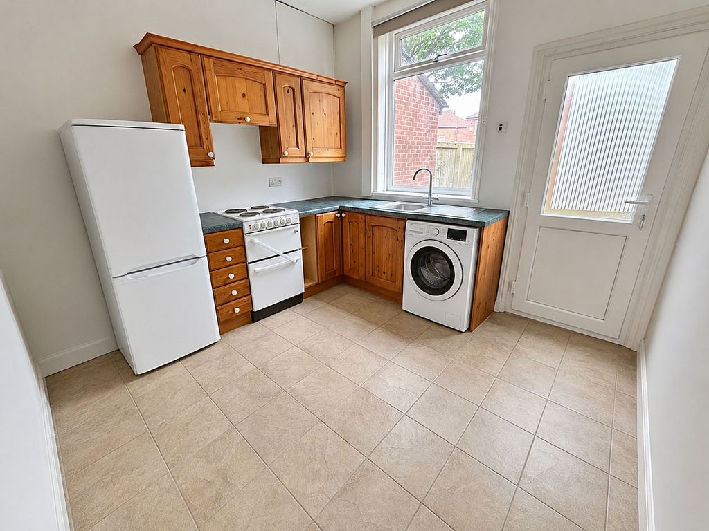 Property photo 3 of 13 Kitchen