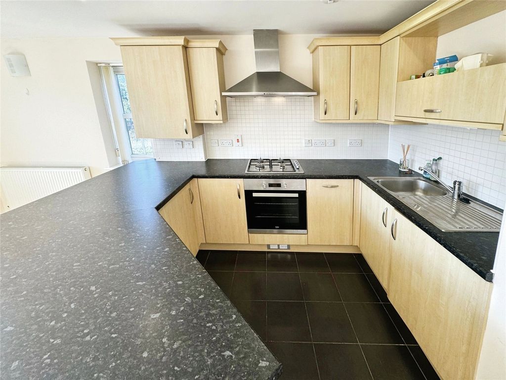 Property photo 3 of 11 Kitchen Area