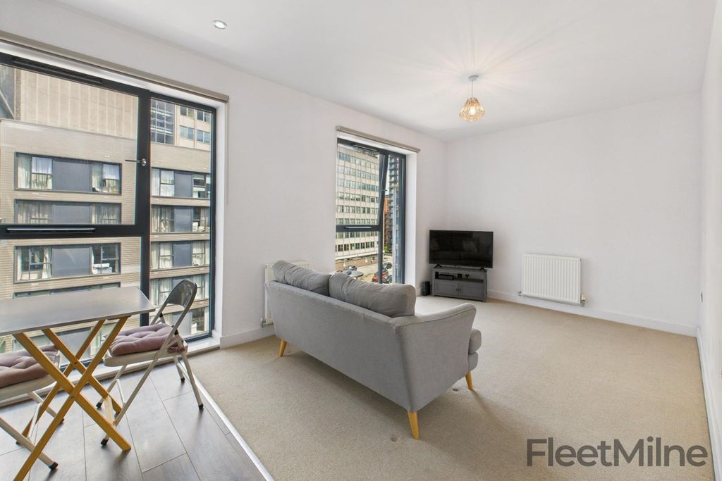 Property photo 3 of 12 Living Area