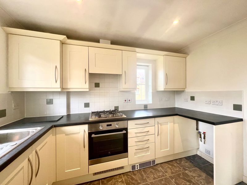 Property photo 2 of 12 Kitchen