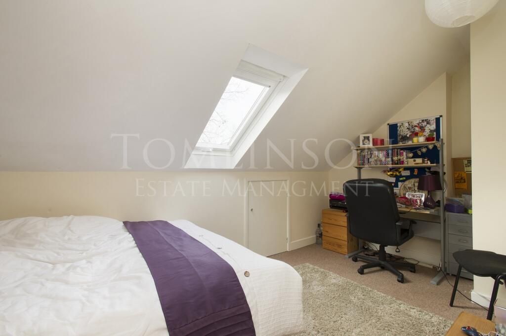 Property photo 1 of 11 A Cozy And Well-Kept Master Bedroom Featuring A Co...
