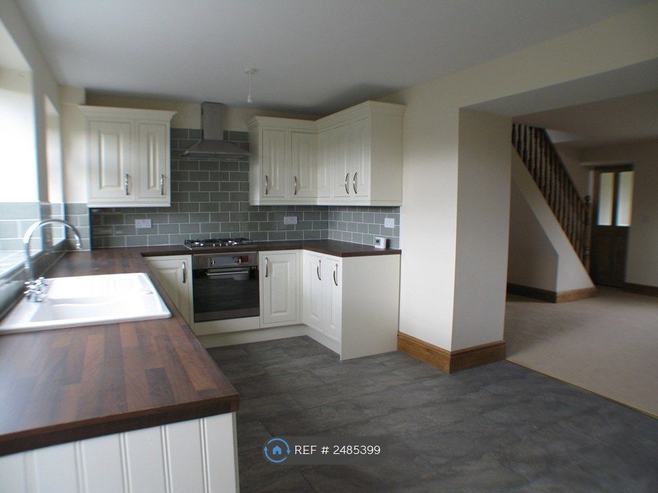 Property photo 2 of 12 Kitchen