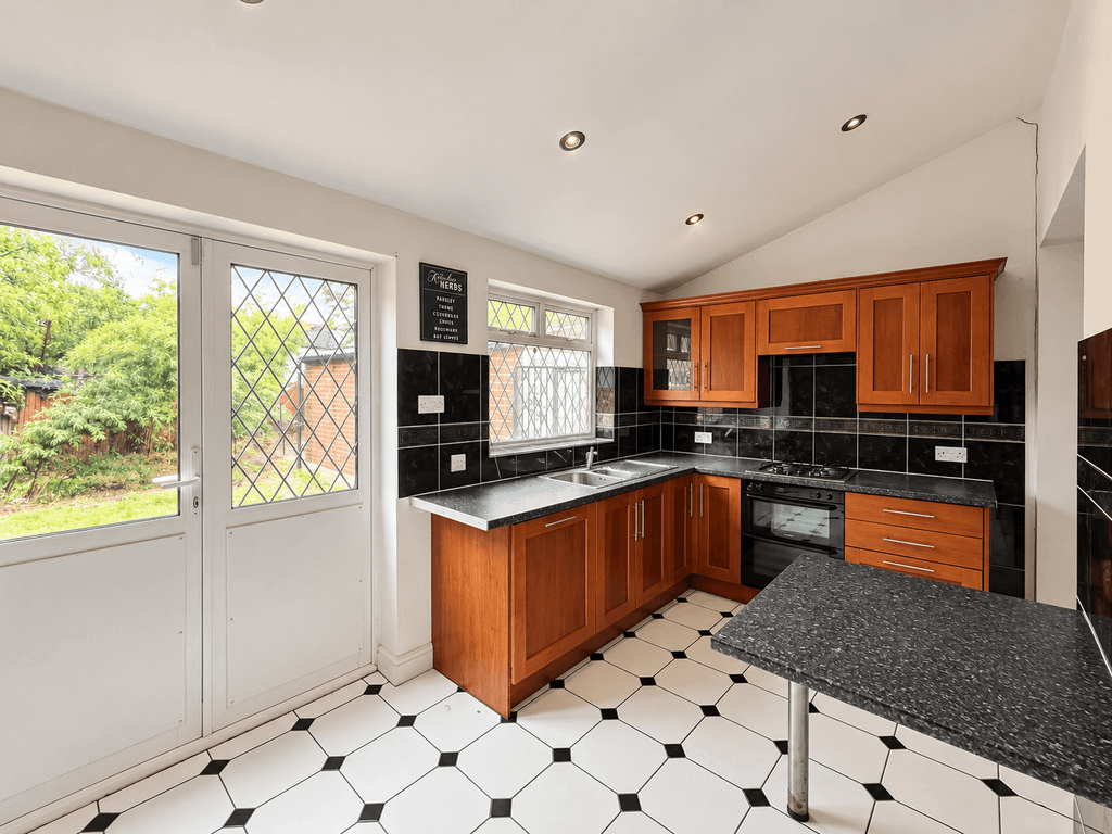 Property photo 3 of 13 Bright, Clutter-Free Kitchen With Garden View