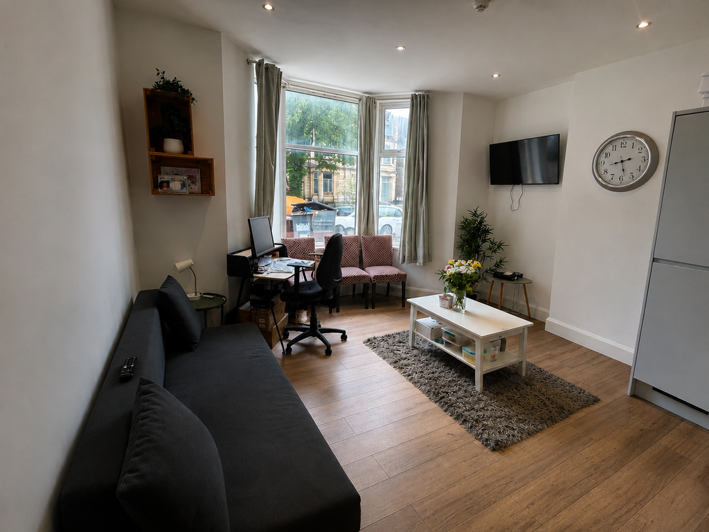 Property photo 3 of 6 Living Area