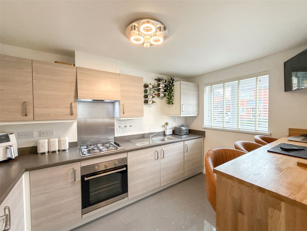 Property photo 3 of 12 Kitchen