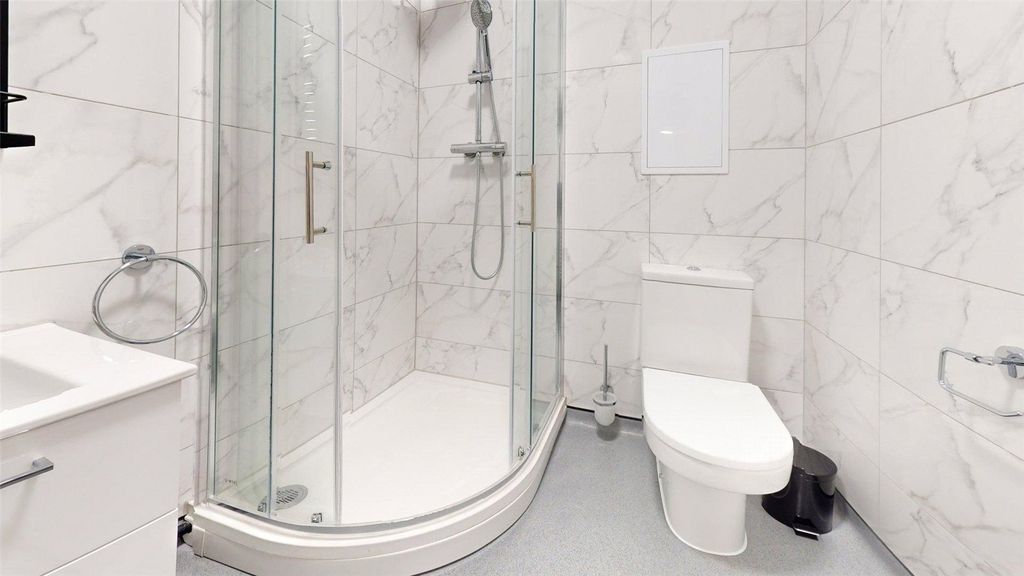 Property photo 3 of 8 Modern And Sleek Bathroom With A Spacious Shower E...