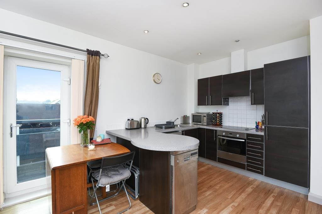 Property photo 3 of 8 Kitchen