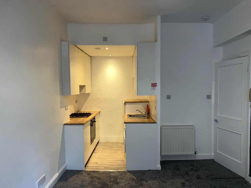 Property photo 3 of 6 Kitchen Area