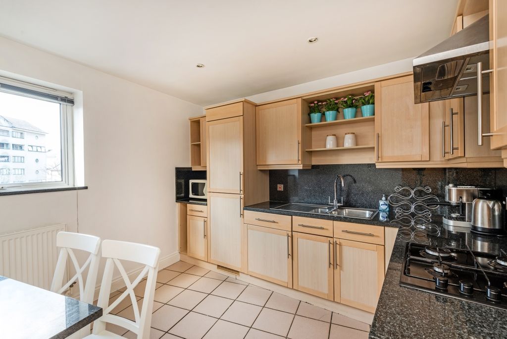Property photo 2 of 8 Kitchen