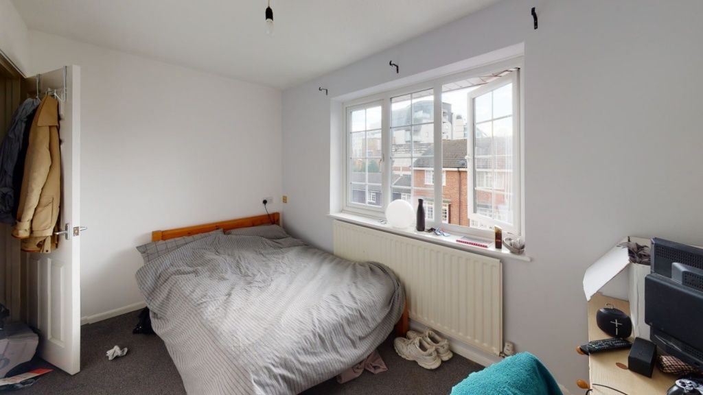 Property photo 3 of 11 A Cozy Double Bedroom Featuring A Large Window Tha...