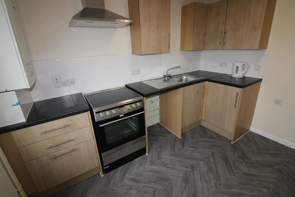 Property photo 3 of 8 Kitchen