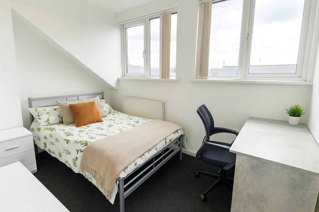 Property photo 3 of 6 Bright And Welcoming Bedroom Featuring A Double Be...