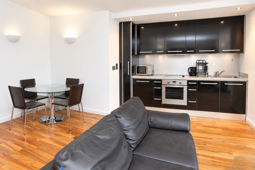 Property photo 3 of 10 Open-Plan Living Space With Sleek Modern Kitchen...