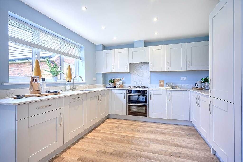 Property photo 2 of 7 Typical Kitchen