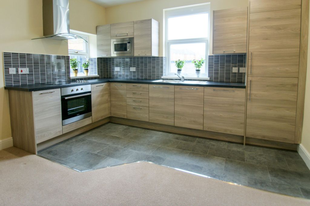 Property photo 1 of 8 Kitchen
