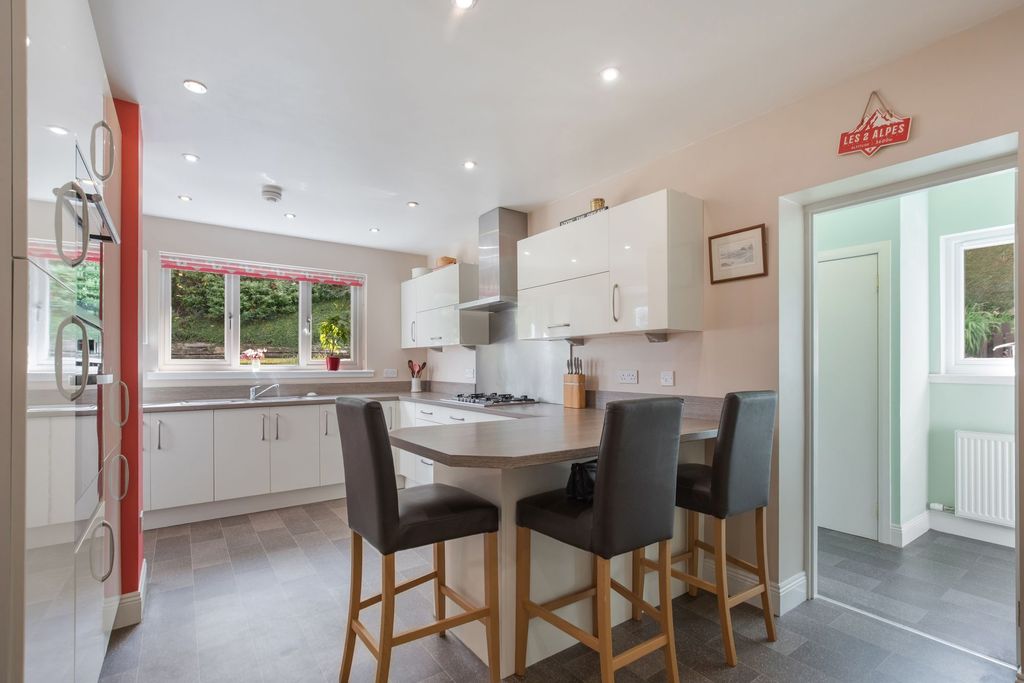 Property photo 3 of 38 Dining Kitchen