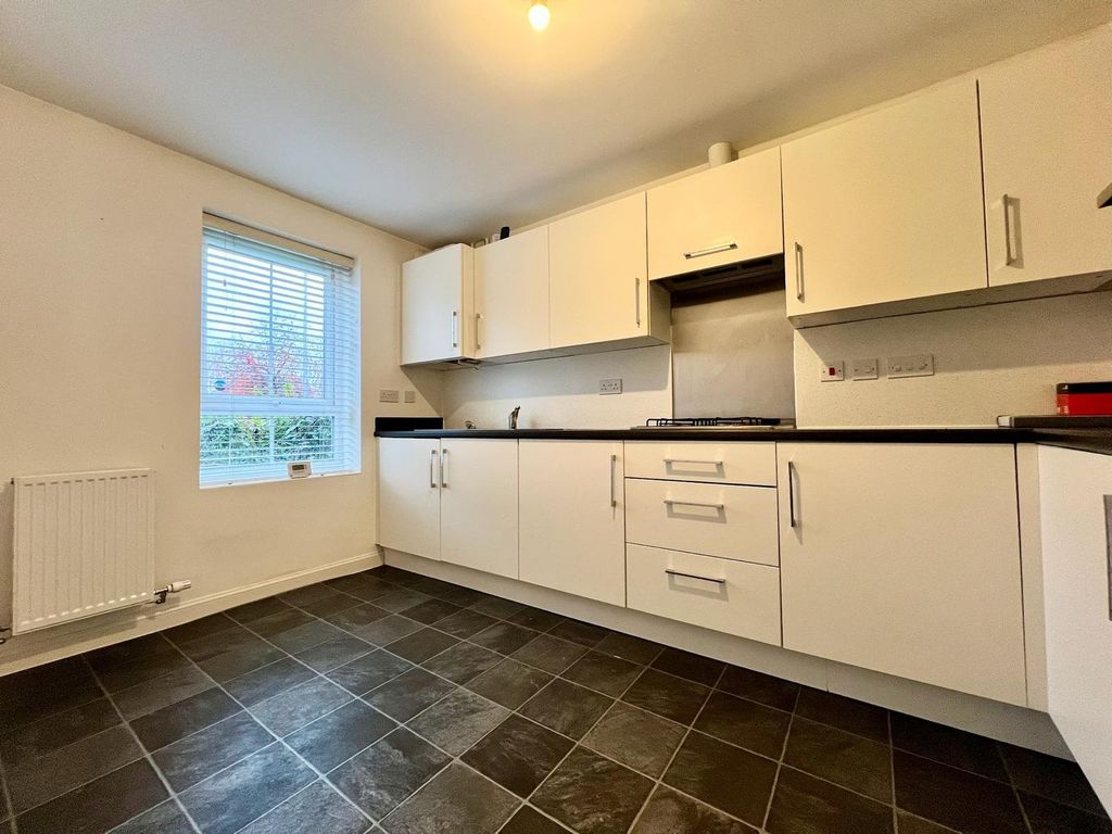 Property photo 2 of 8 Kitchen