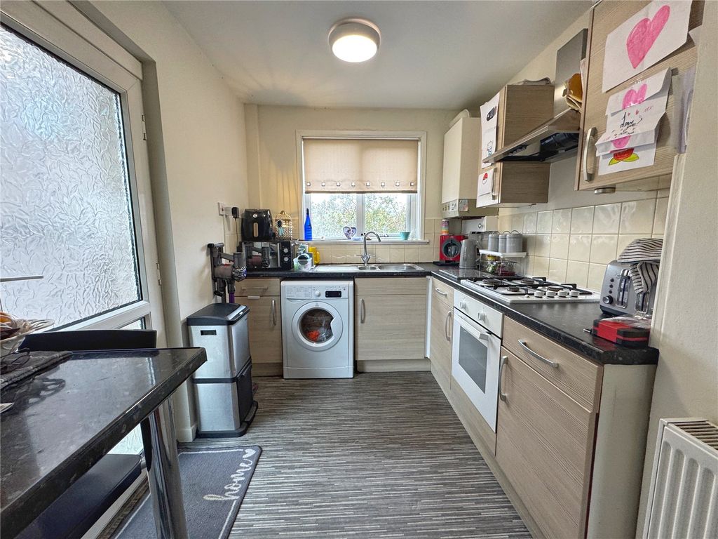 Property photo 3 of 11 Spacious Kitchen