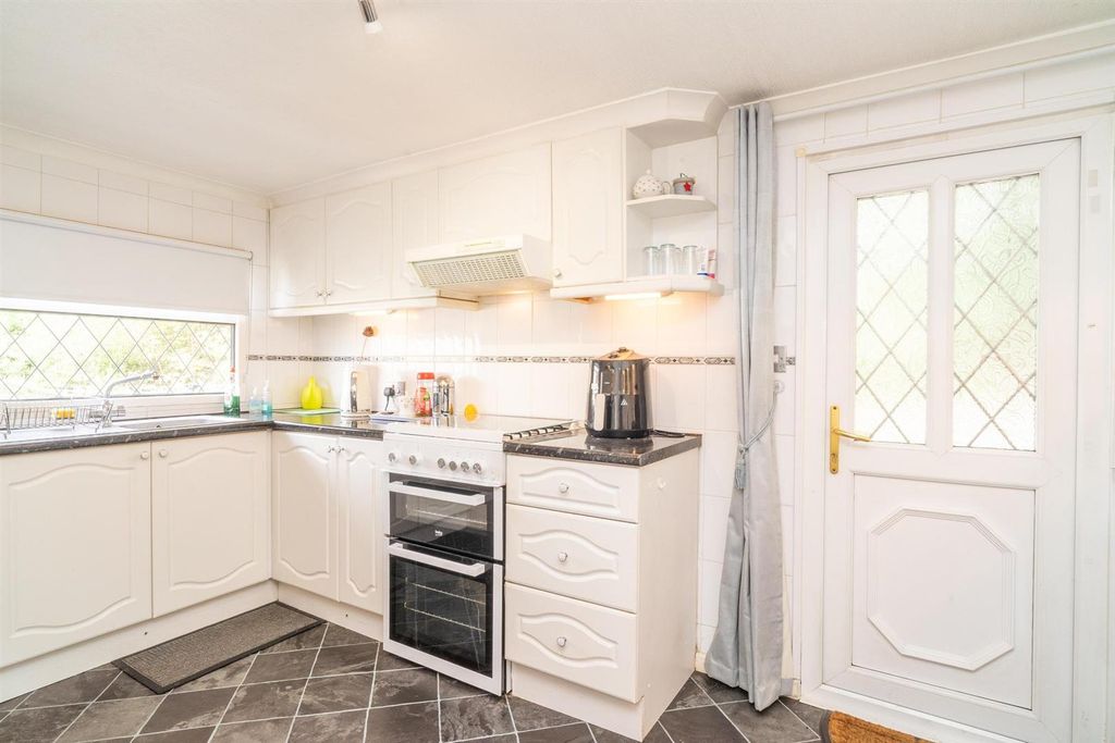 Property photo 3 of 8 Kitchen;