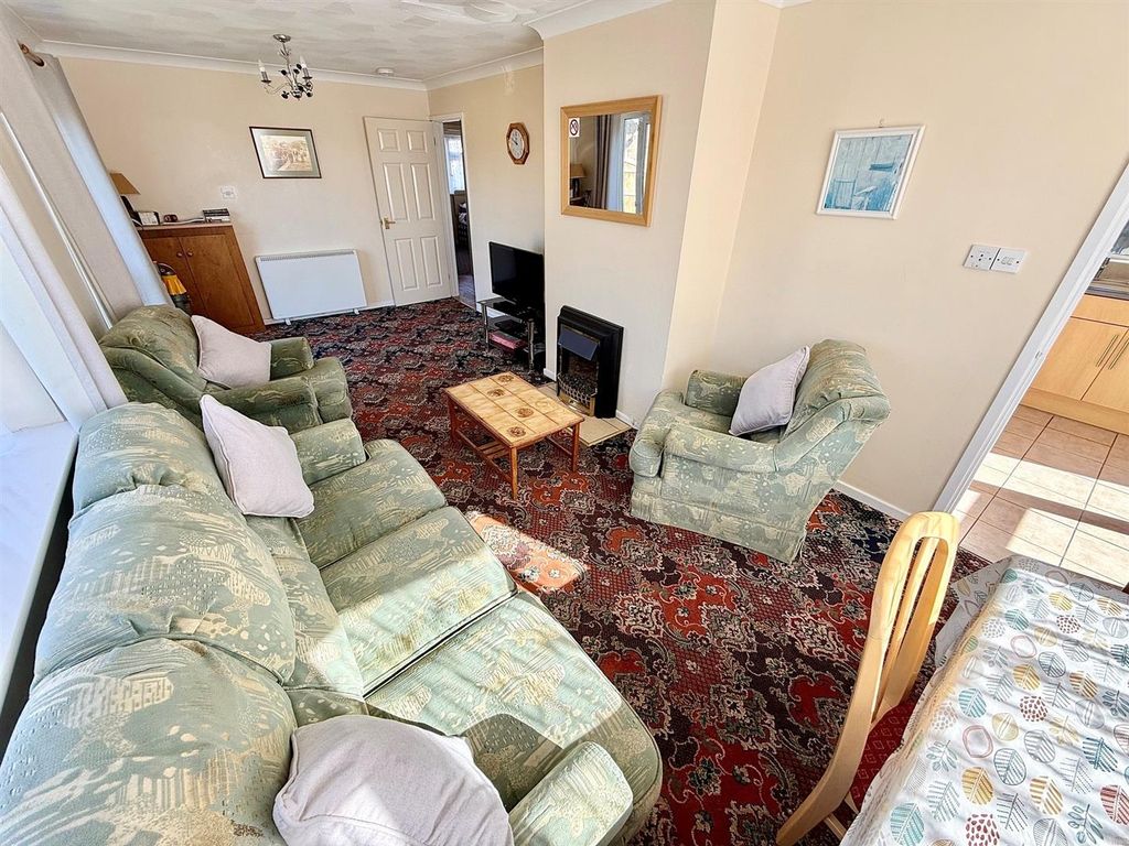 Property photo 2 of 13 Living Area
