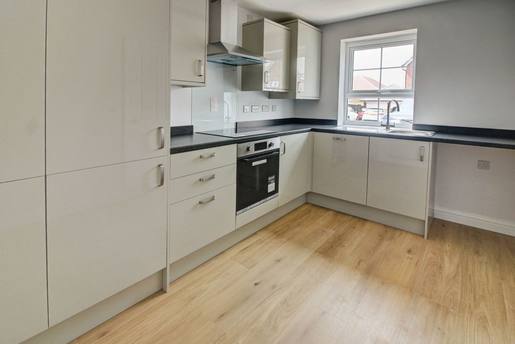 Property photo 2 of 12 Kitchen