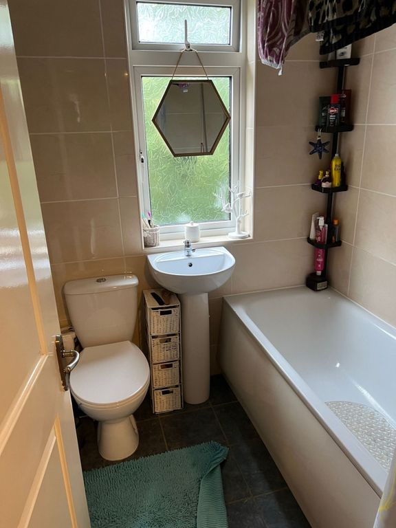 Property photo 2 of 8 Bright, Wellâ€‘Kept Bathroom With A Bathtub, Pedesta...