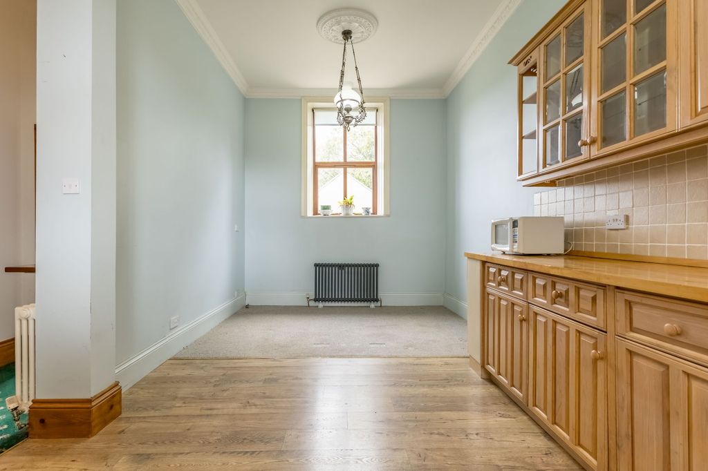 Property photo 3 of 34 Dining Kitchen