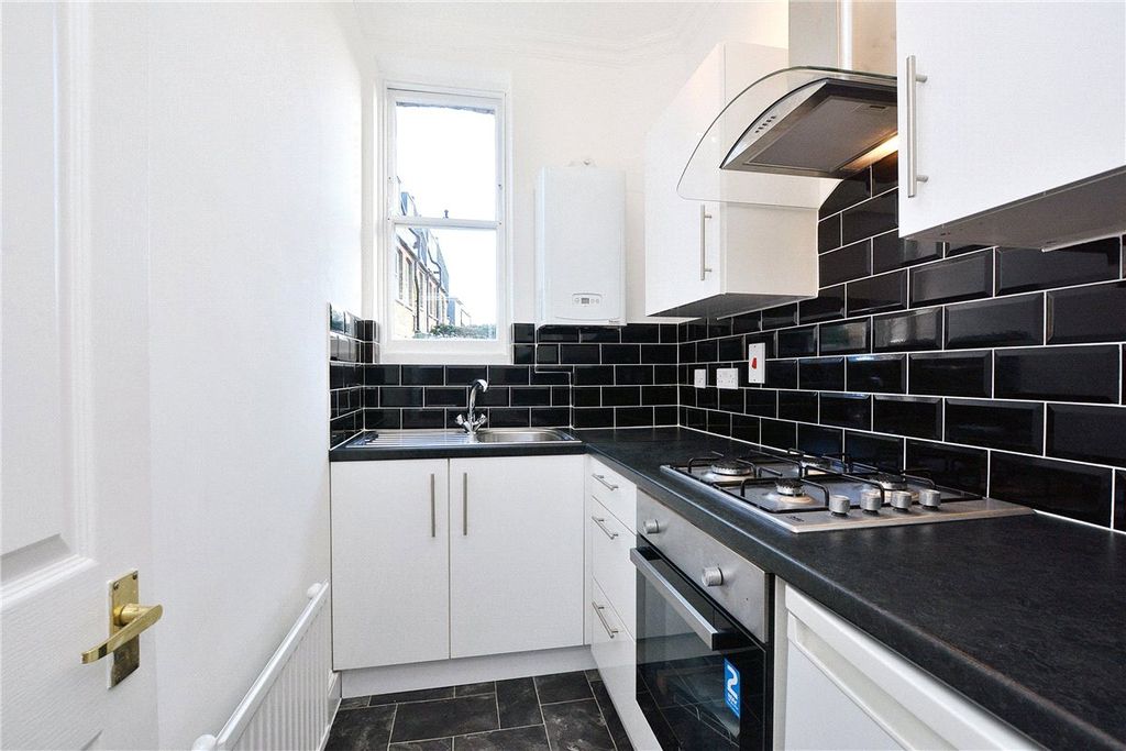 Property photo 2 of 11 Kitchen