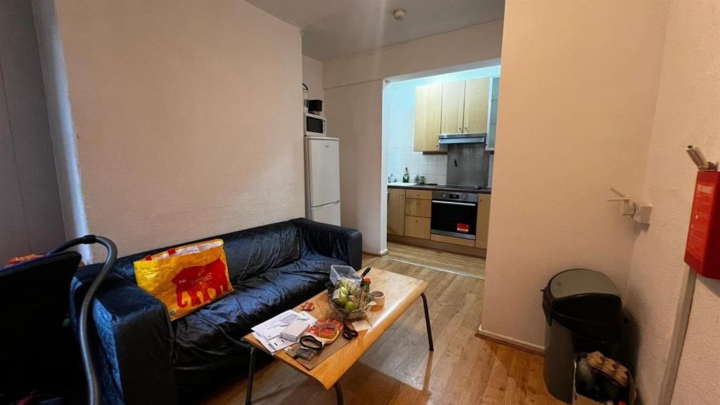 Property photo 1 of 12 A Cozy Living Room Featuring A Comfortable Sofa, A...